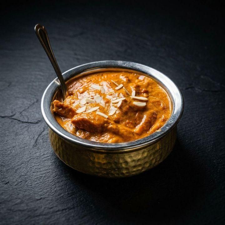 Butter Chicken catered by Taj Indian Cuisine & Bar in Madison, Wisconsin